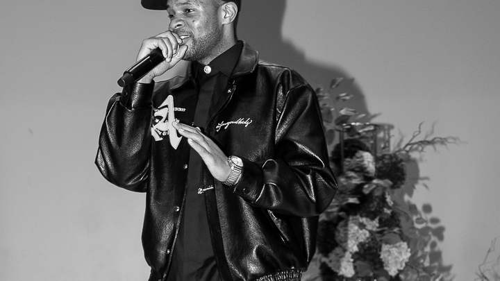 B. Amechi on stage